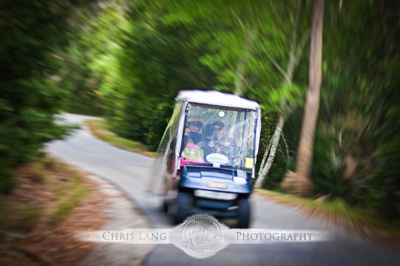Visitors driving in golf cart