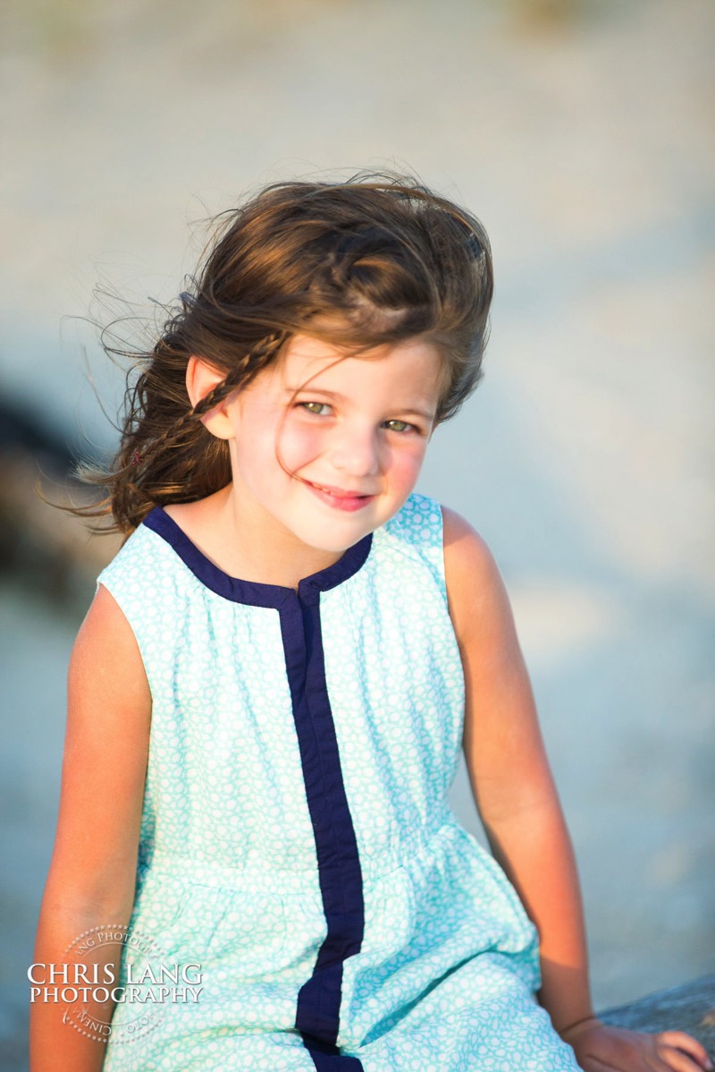 littel girl in sun dress - Places for family vacation - Bald Head Island Photographers - BHI Photography - Kids Portraits -  Pictures on Bald Head Island - BHI Photo Services - Chris Lang Photography 