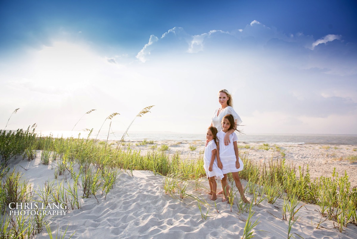 family on the beach dunes - family vacaton image - ocean - blue water - Bald Head Island Family Photo - BHI Photographers - Family Photo - Bald Head Island Photography - Chris Lang Photography  - 