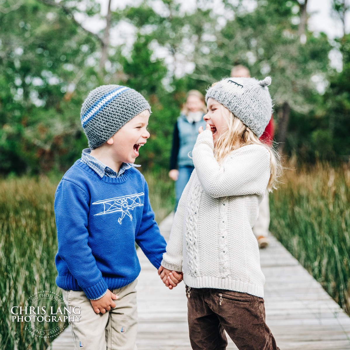young broither and sister having fun and laughing  - candid portraits - Places for family vacation - Bald Head Island Photographers - BHI Photography - Kids Portraits -  Pictures on Bald Head Island - BHI Photo Services - Chris Lang Photography 