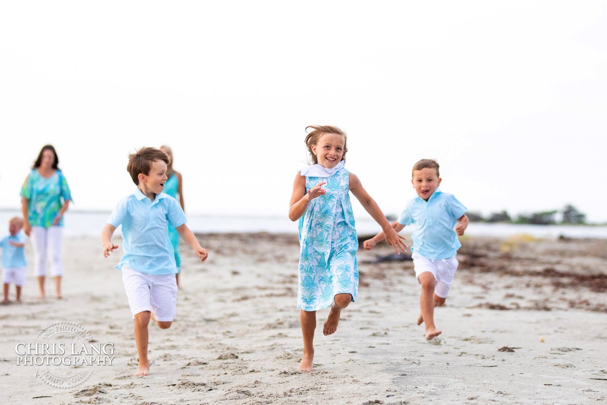 Kids running on the beach at Bald Head Island - Places for family vacation - Bald Head Island Photographers - BHI Photography - Kids Portraits -  Pictures on Bald Head Island - BHI Photo Services - Chris Lang Photography 