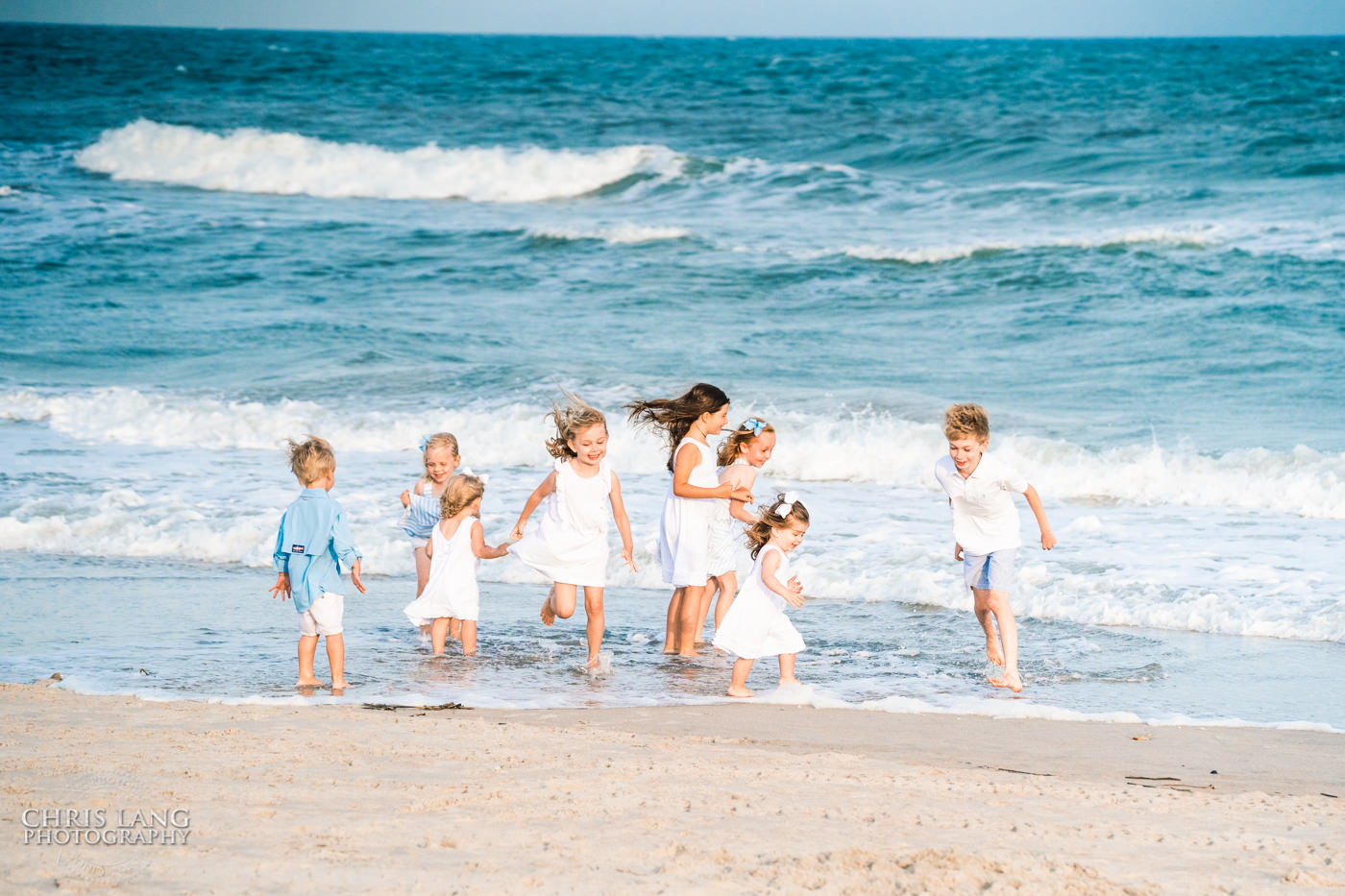 Kids playing on the beach-  Topsail Island - Family photo session - Topsail Island Photographers - Chris Lang Photography - Topsail Island Photos