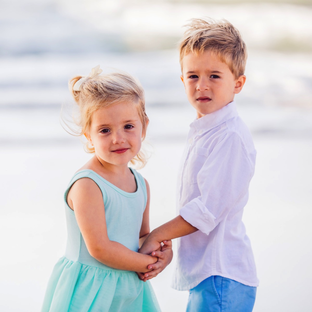 Brother and sister holding hands - Beach family portrait - family portraits - family picture - family photography - wilmington nc family photogrpahers - chris lang photography