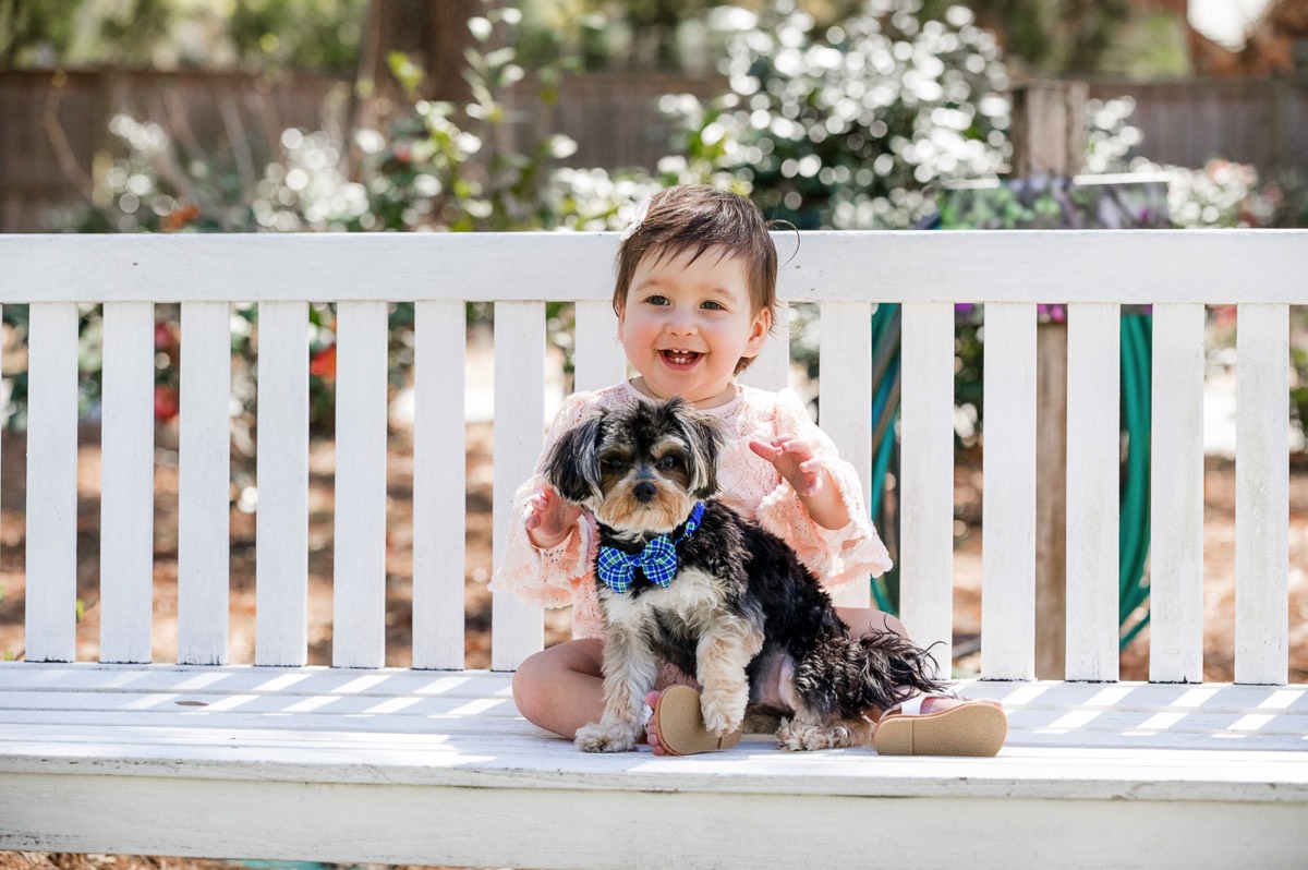Little girl posing with her dog = family portraits - family picture - family photography - wilmington nc family photogrpahers - chris lang photography