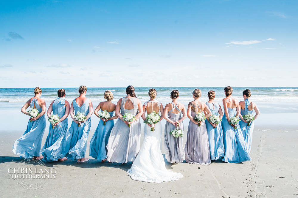 Image of bridesmaids on the beach - Wedding flowers - wedding color ideas for beach weddings - Wrightsville Beach Wedding Photography - Wrightsville Beach Photographers - Wedding Photographer -  Chris Lang Photography - Lifestyle Wedding Photo