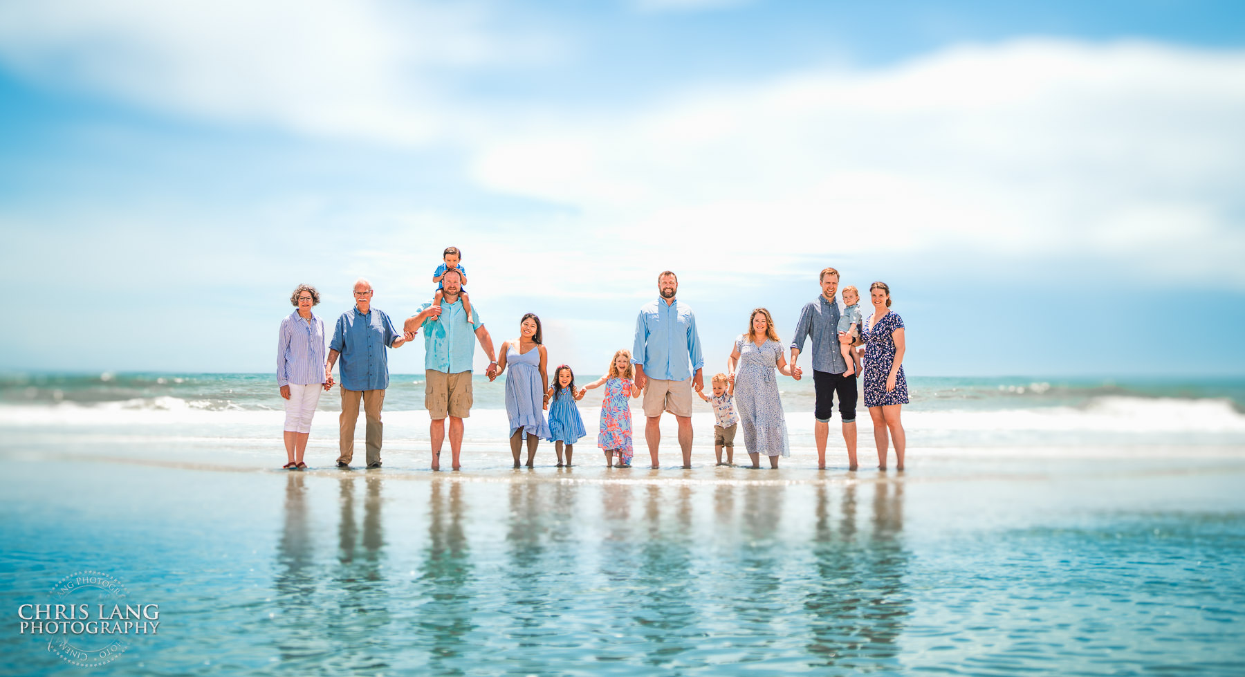 Family Photo with ocean in background - Wrightsville Beach Family Photography - Wrightsville Beach Photographers - Beach Family Photos- Chris Lang Photography 