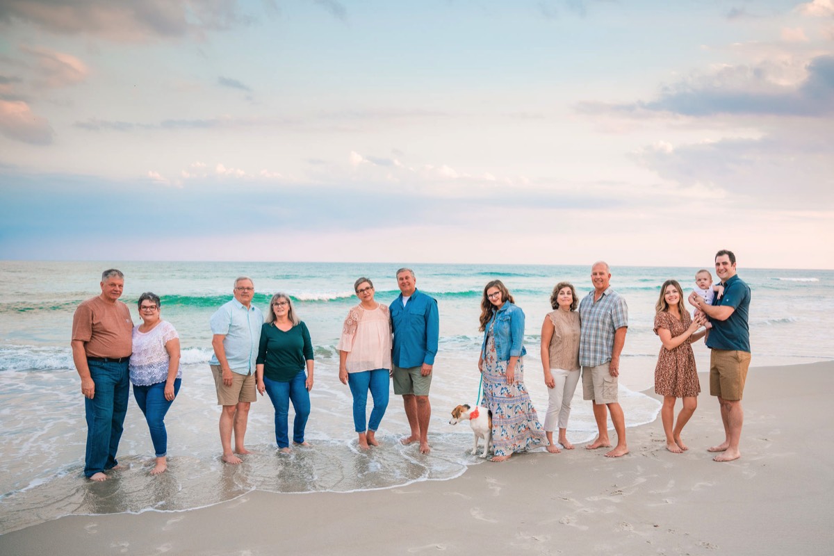 Image of multi generations family photo on the beach - clothing color ideas -for family beach photos - Wrightsville Beach Family Photography - Wrightsville Beach Photographers - Beach Family Photos- Chris Lang Photography  