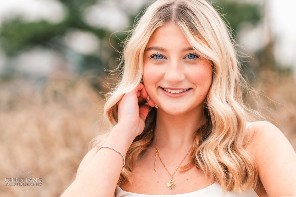 High schoole senior girl pphoto on the beach - blue eyss - Wrightsville Beach High School Senior Photography - Wrightsville Beach Photographers - Beach Senior Portrait  Photos- Chris Lang Photography  