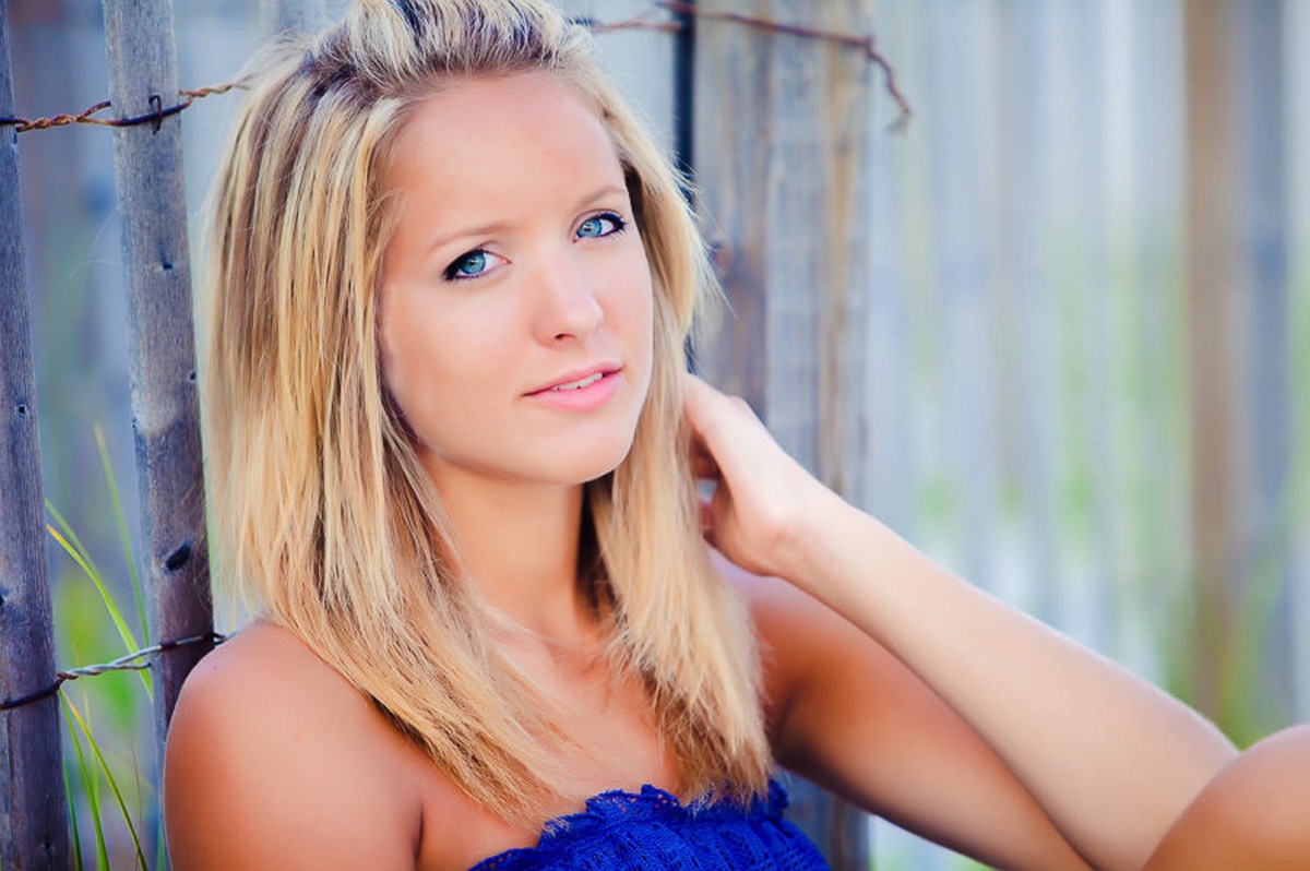 beach headshot of highschool senior girl - sitting on the beach - senior portrait ideas - Wrightsville Beach High School Senior Photography - Wrightsville Beach Photographers - Beach Senior Portrait  Photos- Chris Lang Photography  