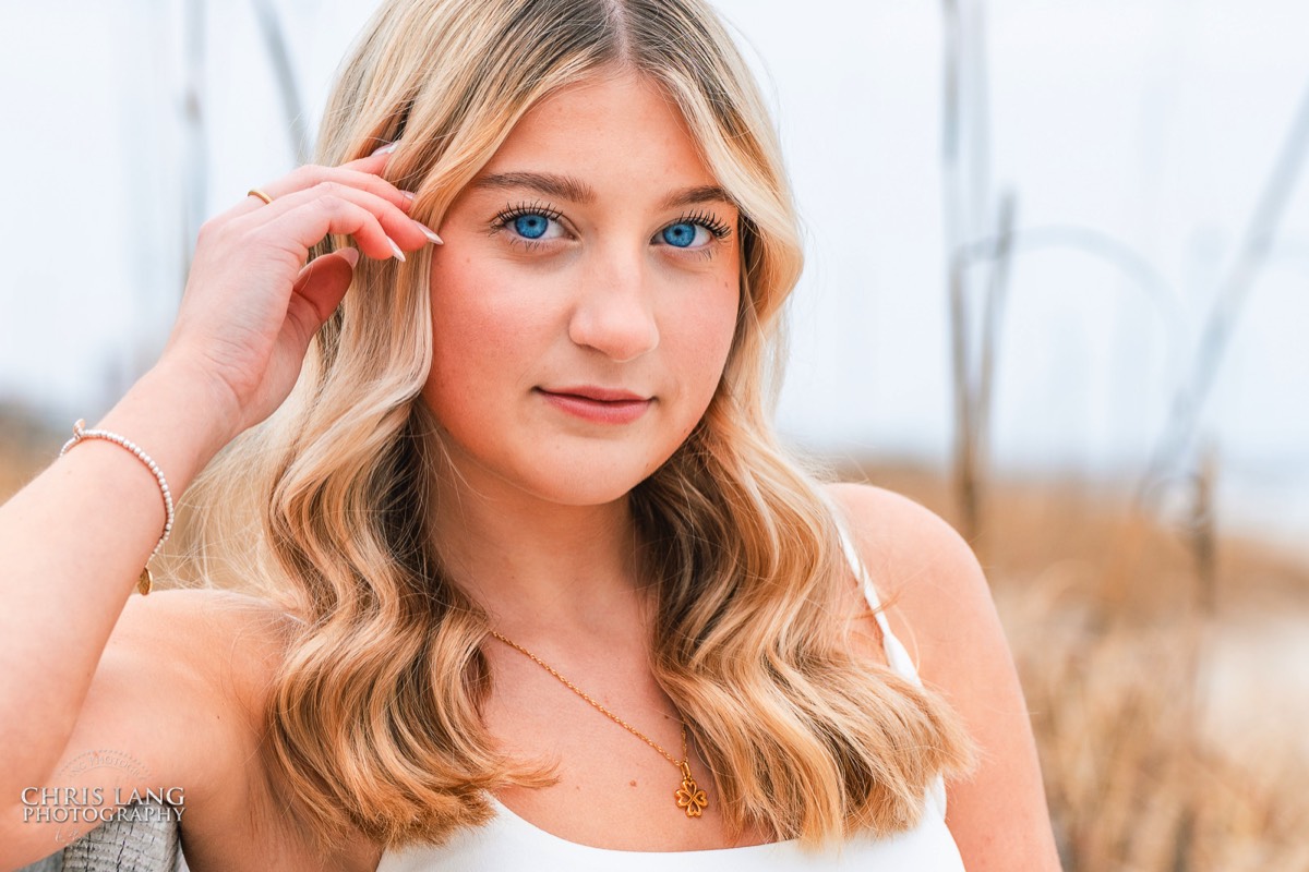 image of highhschool senior on the beach - senior headshots -Wrightsville Beach High School Senior Photography - Wrightsville Beach Photographers - Beach Senior Portrait  Photos- Chris Lang Photography  