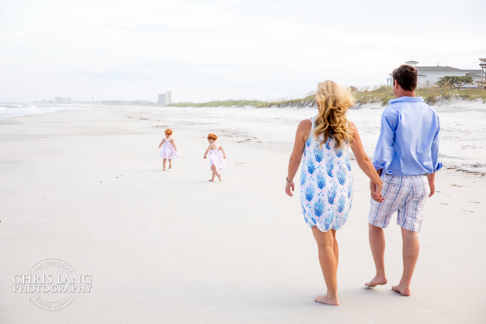 family walking on the beach on Figure 8 - Figure Eight Island Photography - Photographers - Figure 8 Island  - Photography Services - Chris Lang Photography - 