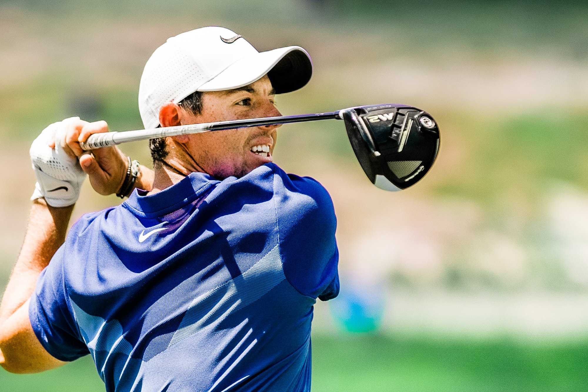 North Carolina Sports Photographers - Chris Lang Photography - Photo of  Rory  Mcllroy-   Sports Photography - professional  sports - golf - tee box - gold driver  