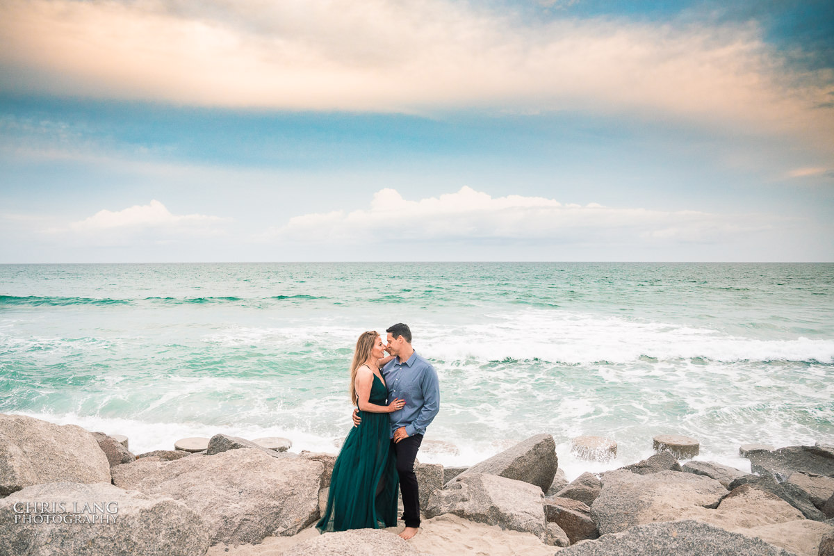 Beach photo with couple - Fort Fisher North Carolina -  Engagement Photography - Popular engagement photography locations - Lifestyle engagement photography -  Ft Fisher engagement photographers - Engagement session ideas - Trends in engagement photography - Chris Lang Photography - Engagement photos 