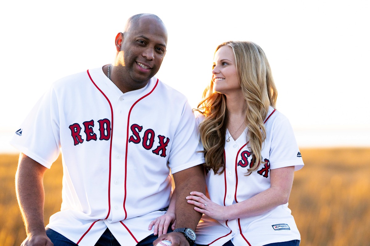 Couple wearinf Red Sox baseball jersys - Fort Fisher North Carolina -  Engagement Photography - Wedding Ideas - Popular engagement photography locations - Lifestyle engagement photo -  Ft Fisher engagement photographers - Engagement session ideas - New trends in engagement photography - Chris Lang Photography