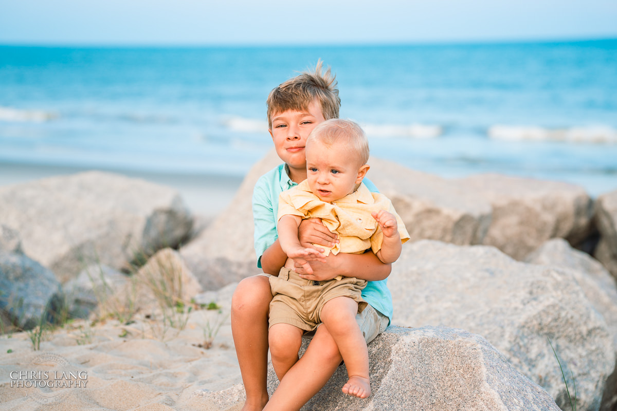 Young boy - toddler - beach-  ocean - Fort Fisher- Family Photo Session- Fort Fisher Photography - Photos in Fort Fisher - Family Portraits -