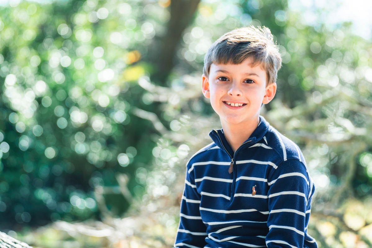 Young boy in the oak trees  - Fort Fisher- Family Photo Session- Fort Fisher Photography - Photos in Fort Fisher - Family Portraits -