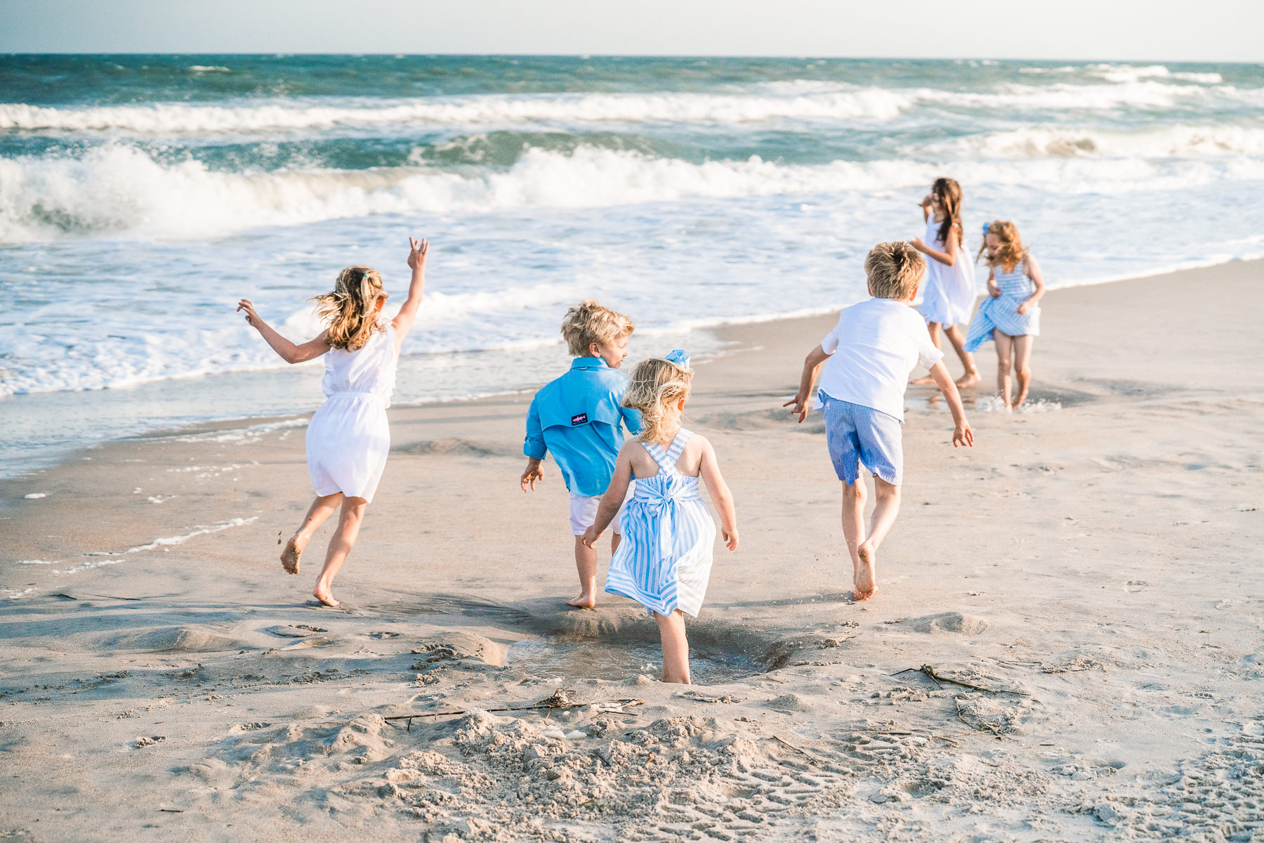 Kids playing on the  beach at Fort Fisher- Family Photo Session- Fort Fisher Photography - Photos in Fort Fisher - Family Portraits 