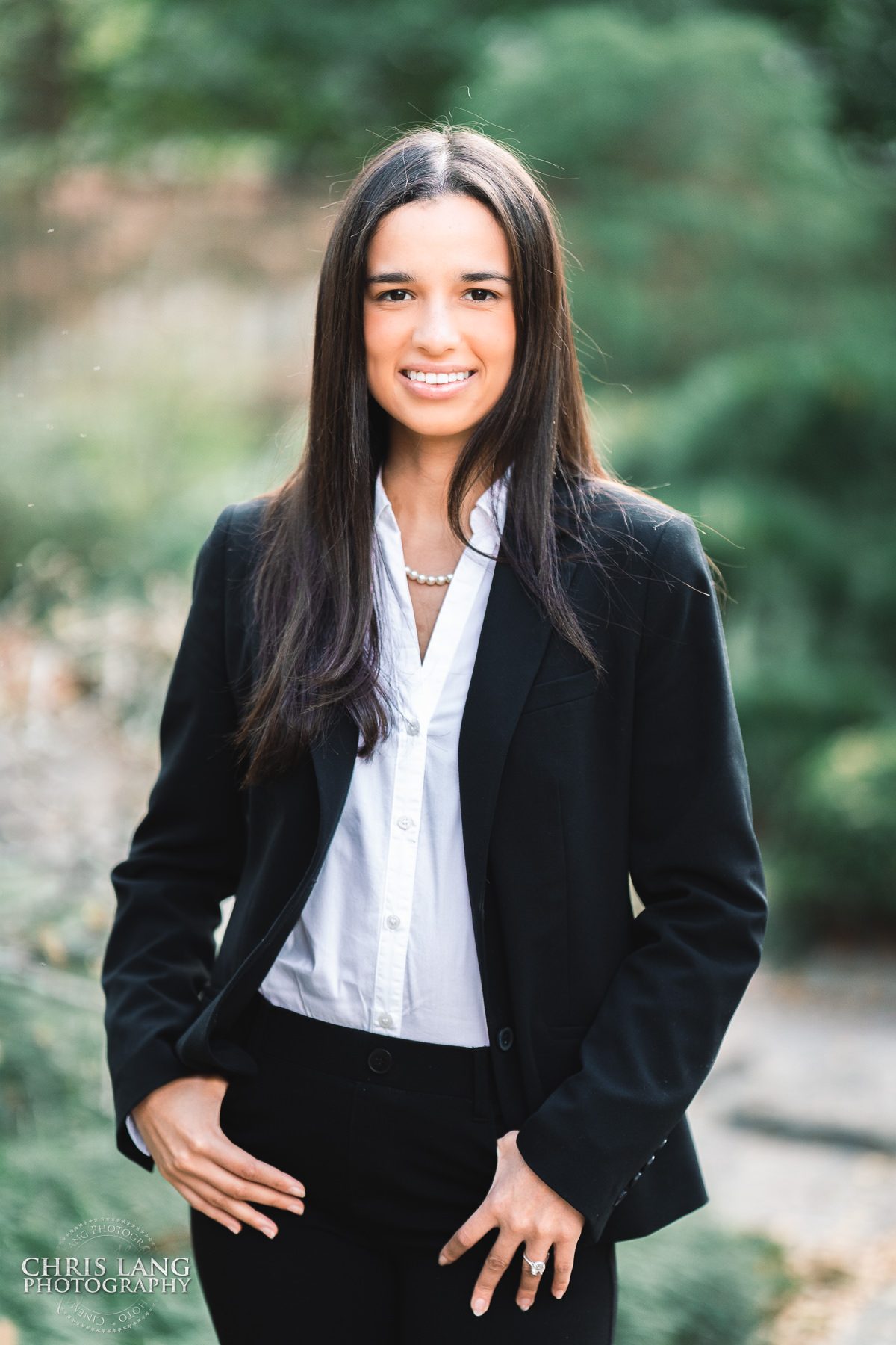 Wilmington NC Headshot and Portrait Photographer -  Headshot of a female business professional - The Arboretum - Black pant suit