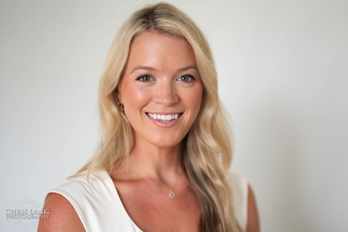 Femail smiling for a High Key style headshot - Image of Studio Headshots - Headshot Photography  - Portrait Photo - Wilmington NC Headshot Photographer - Chris Lang Photography -