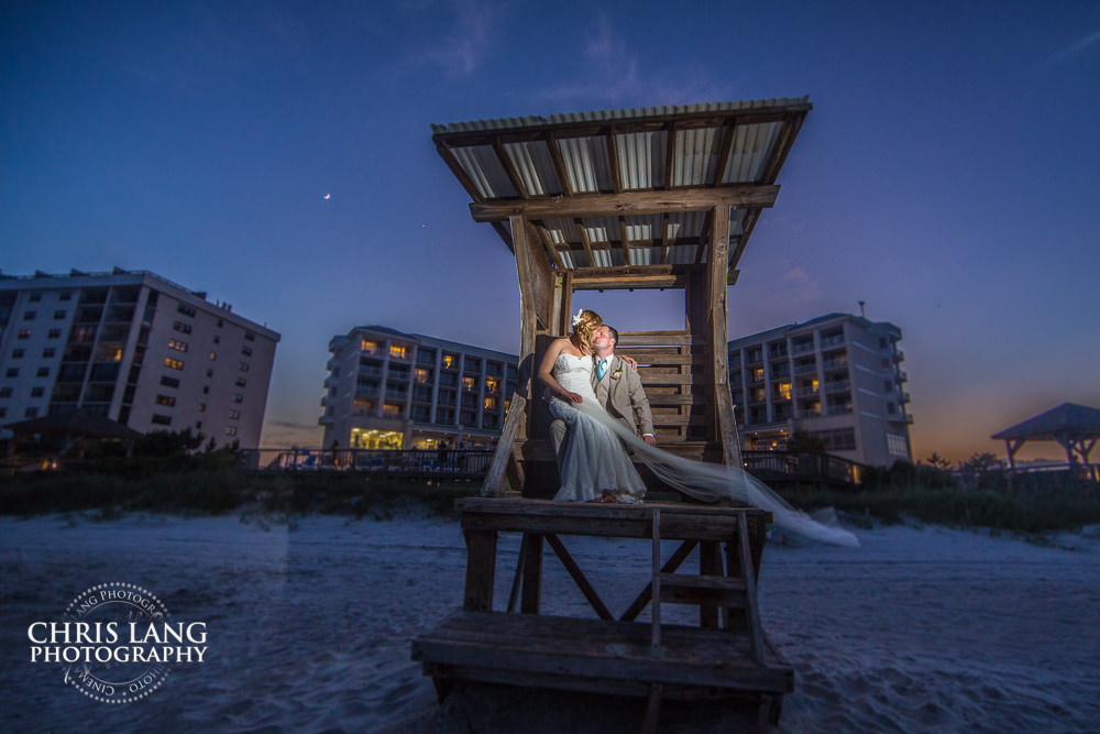 Wrightsville Beach Wedding - Bride and groom on Lifeguard tower  - Beach Wedding Photography, Beach Wedding Photographers - Beach Wedding Ideas - Chris Lang Photography