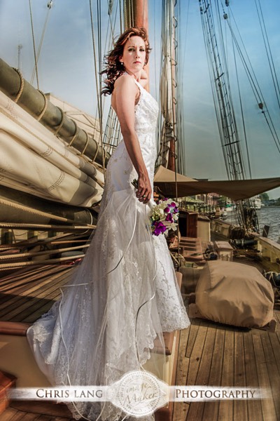 Picture of Bride in wedding dress on tall ship on Cape Fear RIver
