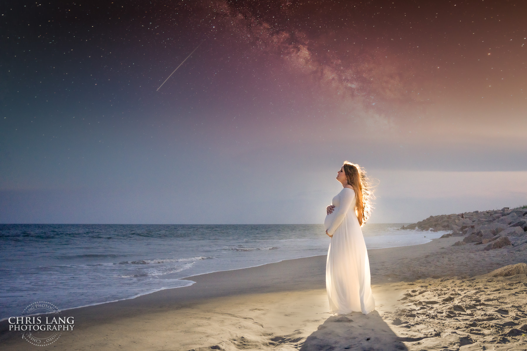 Maternity photo on the beach at Ft Fisher - Sunset - Twilight - White Maternity Dress -  baby bump photo -  Wilmington NC maternity photographers - Chris Lang Photography -  pregnancy photos -  maternity photo ideas - 