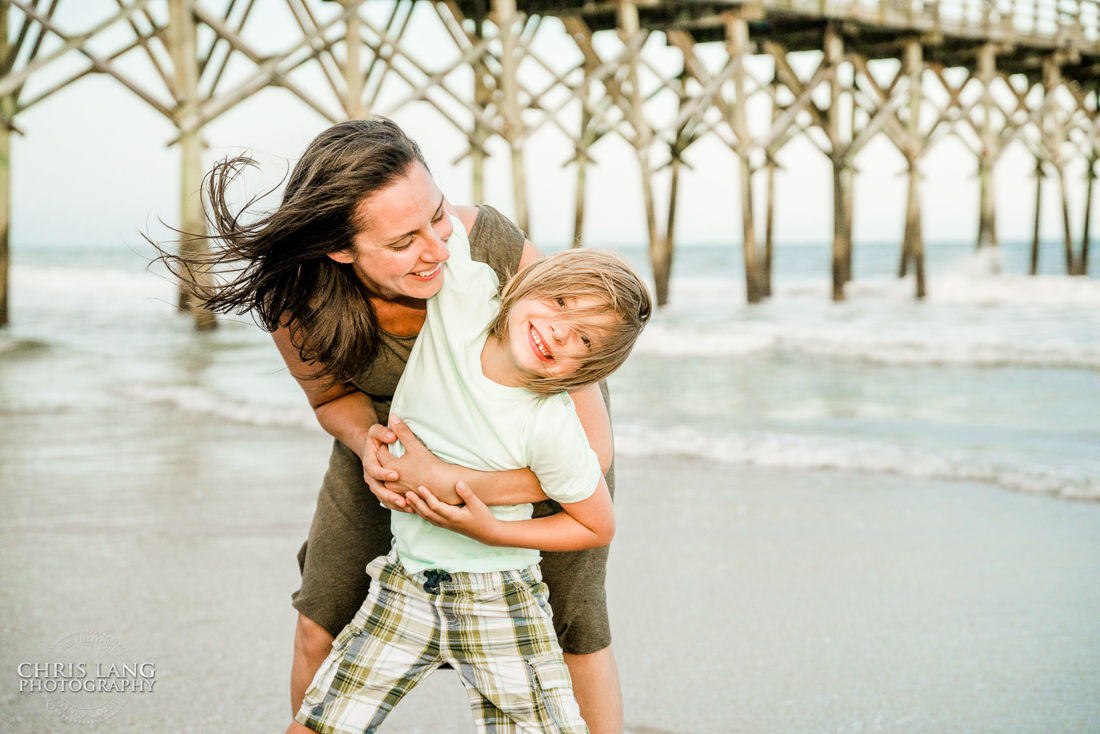  Mom and son playing on the beach - -Topsail Island Photography - Topsail Island NC Photographers - Chris Lang Photography -  Beach Photography - Family Photographer - Family photo - Beach Photographer - Beach Portraits -  Coastal Lifestyle Photography