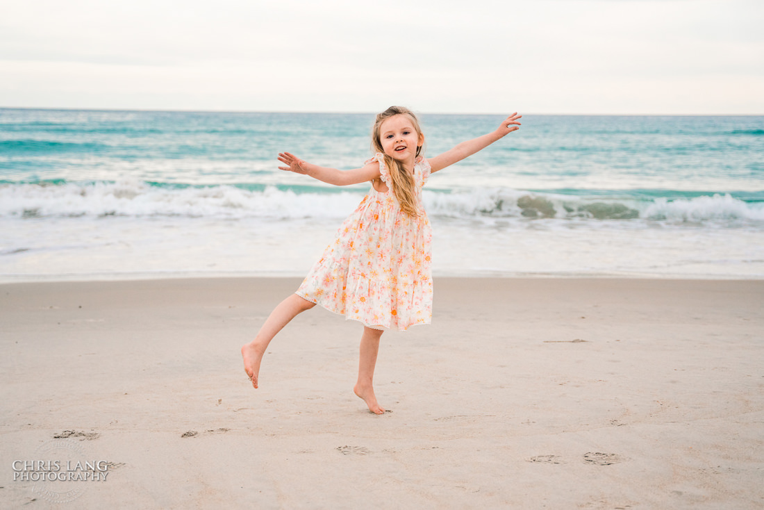 Little Girl Dancing  on the beach - Topsail Island Photography - Topsail Island NC Photographers - Chris Lang Photography -  Beach Photography - 