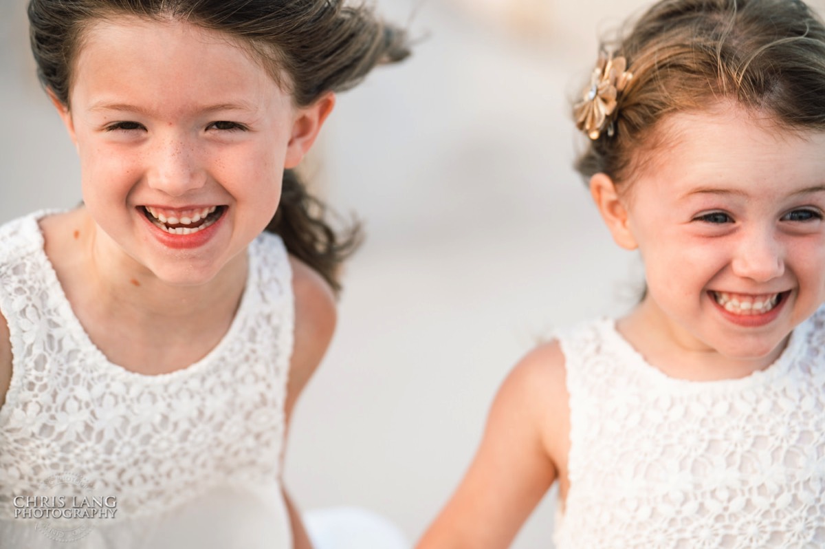 Little girls laughing on the beach - Topsail Island Photography - Topsail Island NC Photographers - Chris Lang Photography -  Beach Photography - 